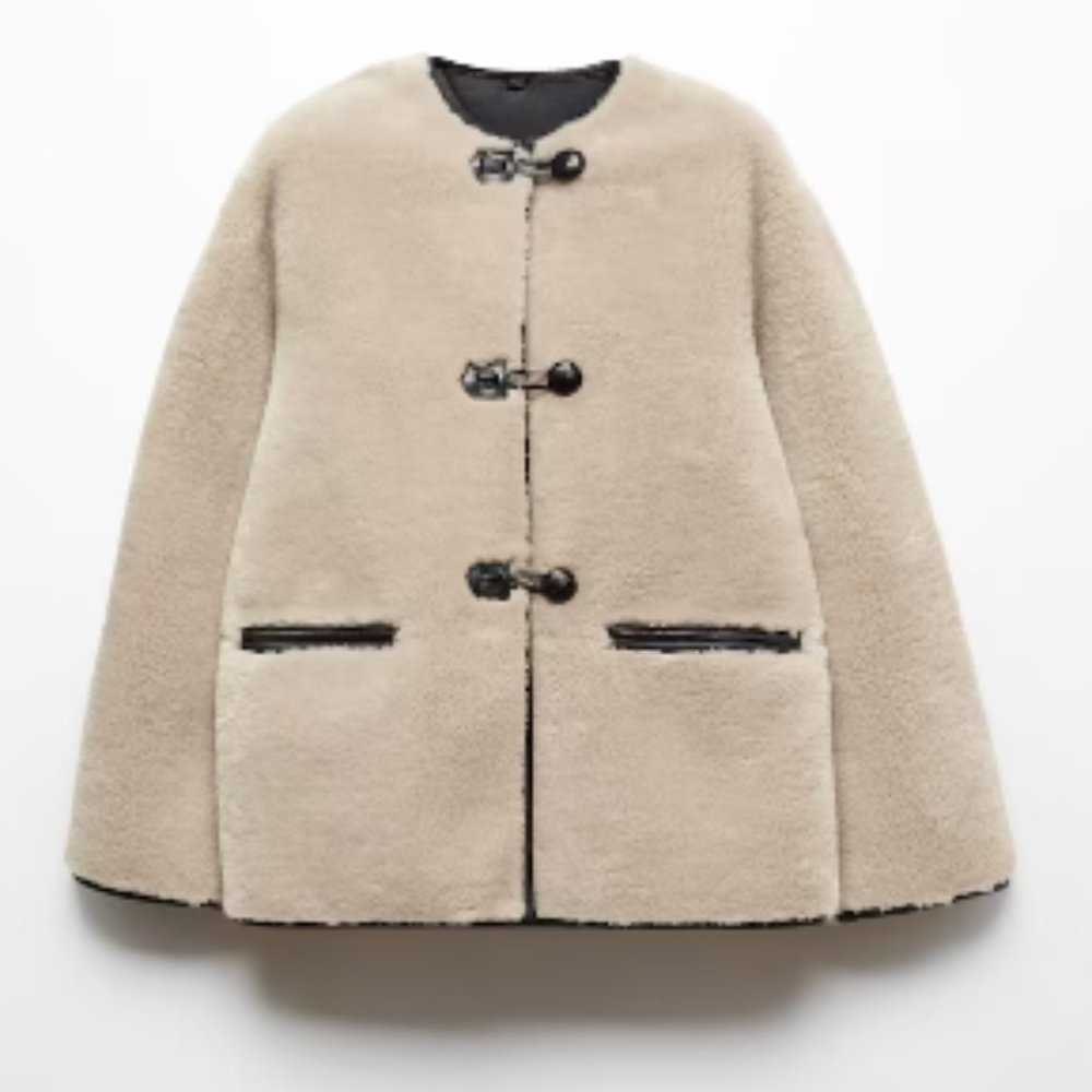 Mango Fur-effect coat with appliqués